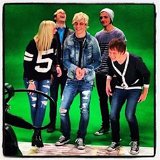 R5  Laughs during an interview.
