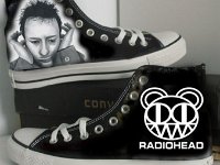 Radiohead  Pair of black high top chucks with drawn on graphics of Radiohead.