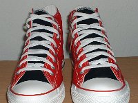 Red and Black 2-Tone Chucks  Red and black 2-tone high tops, new with tag, front view.
