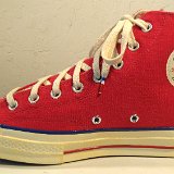Red Chuck 70 Vintage Canvas High Tops  Inside patch view of a  right red Chuck 70 vintage canvas high top.