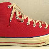 Red Chuck 70 Vintage Canvas High Tops  Outside view of a right red Chuck 70 vintage canvas high top.