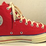 Red Chuck 70 Vintage Canvas High Tops  Inside patch view of a left red Chuck 70 vintage canvas high top.