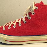Red Chuck 70 Vintage Canvas High Tops  Outside view of a left red Chuck 70 vintage canvas high top.