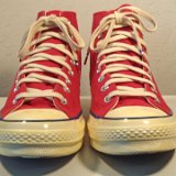 Red Chuck 70 Vintage Canvas High Tops  Front view of red Chuck 70 vintage canvas high tops.