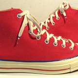 Red Chuck 70 Vintage Canvas High Tops  Outside views of red Chuck 70 vintage canvas high tops.