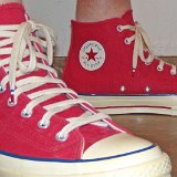 Red Chuck 70 Vintage Canvas High Tops  Wearing red Chuck 70 vintage canvas high tops, right side view 1.