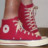 Red Chuck 70 Vintage Canvas High Tops  Wearing red Chuck 70 vintage canvas high tops, right side view 3.
