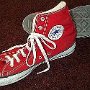 Red High Top Chucks  Red high tops, angled inside patch and covered sole views.