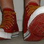 Red High Top Chucks  Stepping out in red and gold high top chucks.