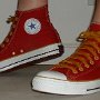 Red High Top Chucks  Wearing red and gold foldover chucks, side views.