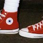 Red High Top Chucks  Wearing new red high tops, left side view.