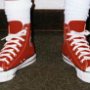 Red High Top Chucks  Wearing new red high tops, front view.