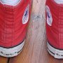 Red High Top Chucks  Wearing red high tops, rear view.