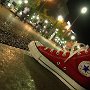 Red High Top Chucks  Wearing red high top chucks on a street curb, inside patch view.