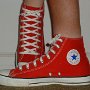 Red High Top Chucks  Wearing red high top chucks, left side and top views.