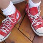 Red High Top Chucks  Wearing red high tops, front and top views.