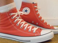 Red Clay High Top Chucks  Wearing red clay high top chucks, left view 1.