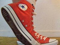 Red Clay High Top Chucks  Wearing red clay high top chucks, left view 2.
