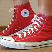 Red Days Ahead High Top Chucks  Wearing red days ahead high tops, left side view 1.
