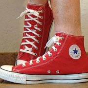 Red Days Ahead High Top Chucks  Wearing red days ahead high tops, left side view 2.