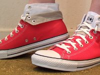Red Foldover Double Upper High Top Chucks  Wearing rolled down red and white foldover double upper high top chucks with shorts, left side view.