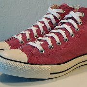 2011 Red Stonewashed Canvas High Top Chucks  Angled side view of 2011 red stonewashed canvas high tops.