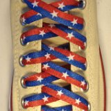 Red, White and Blue Shoelaces on Chucks  Natural white low top chuck with Red and Blue Stripe plus White Star print shoelaces.