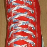 Red, White and Blue Shoelaces  Red high top chuck with red, white and blue weave shoelaces.
