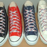 Red, White and Blue Shoelaces  Core color high top chucks with red, white and blue weave shoelaces.