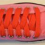 Orange Retro Shoelaces  Pink low top chuck with orange retro shoelaces.