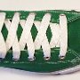 White Retro Shoelaces  Celtic green high top with white retro laces.