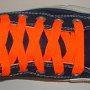 Neon Orange Retro Shoelaces  Navy blue high top with neon orange retro laces.