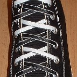 Reversible Shoelaces On Chucks  Black high top with black and white reversable laces.