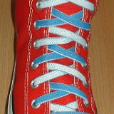 Reversible Shoelaces On Chucks  Red high top with Carolina blue and white reversable laces.