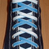 Reversible Shoelaces On Chucks  Navy blue high top with Carolina blue and white reversable laces.