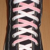 Reversible Shoelaces On Chucks  Black high top with pink and white reversable laces.