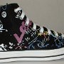 Rock and Roll High Top Chucks  Outside view of a right black punk print high top.