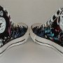 Rock and Roll High Top Chucks  Angled rear view of black punk print high tops.