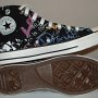 Rock and Roll High Top Chucks  Inside patch and sole views of black punk print high tops.