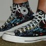 Rock and Roll High Top Chucks  Wearing black punk print high tops, left side view 1.