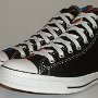 Rock and Roll High Top Chucks  Angled side view of black Grateful Dead high tops.
