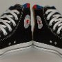Rock and Roll High Top Chucks  Angled front view of black Grateful Dead high tops.