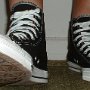 Rock and Roll High Top Chucks  Wearing black Grateful Dead high tops, front view 2.