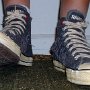 Rock and Roll High Top Chucks  Stepping out in a pair of Ramone's high tops with hemp laces, front view 1.