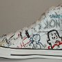 Rock and Roll High Top Chucks  Inside patch view of a right white punk print high top.