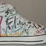Rock and Roll High Top Chucks  Outside view of a right white punk print high top.