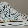 Rock and Roll High Top Chucks  Inside patch view of a left white punk print high top.