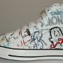 Rock and Roll High Top Chucks  Outside view of a left white punk print high top.