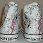 Rock and Roll High Top Chucks  Rear view of white punk print high tops.