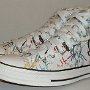 Rock and Roll High Top Chucks  Angled side view of white punk print high tops.
